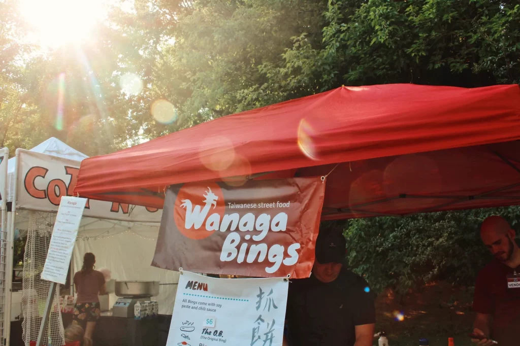 red food tent selling Taiwanese street food