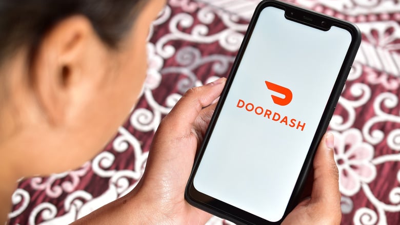 Student opening doordash